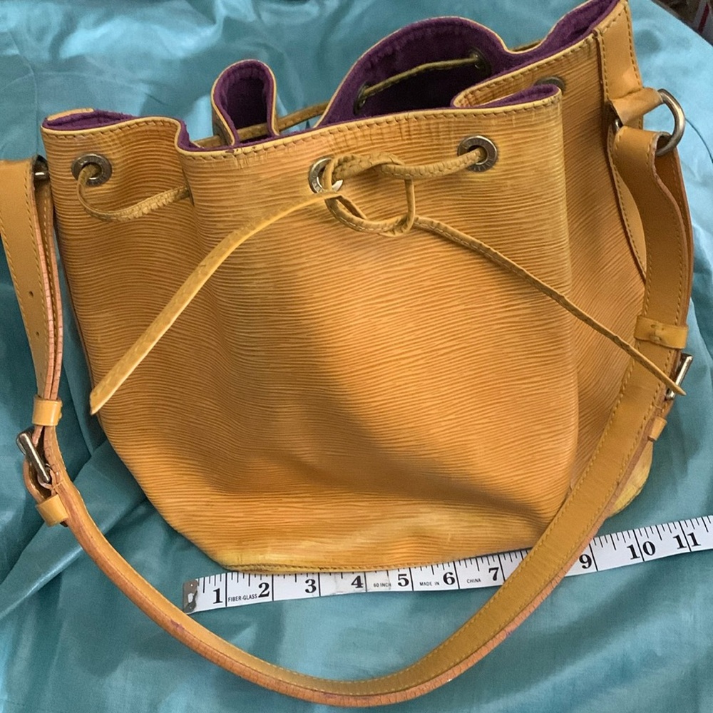 Authentic Louis Vuitton Petit Noe Epi Yellow Bag.